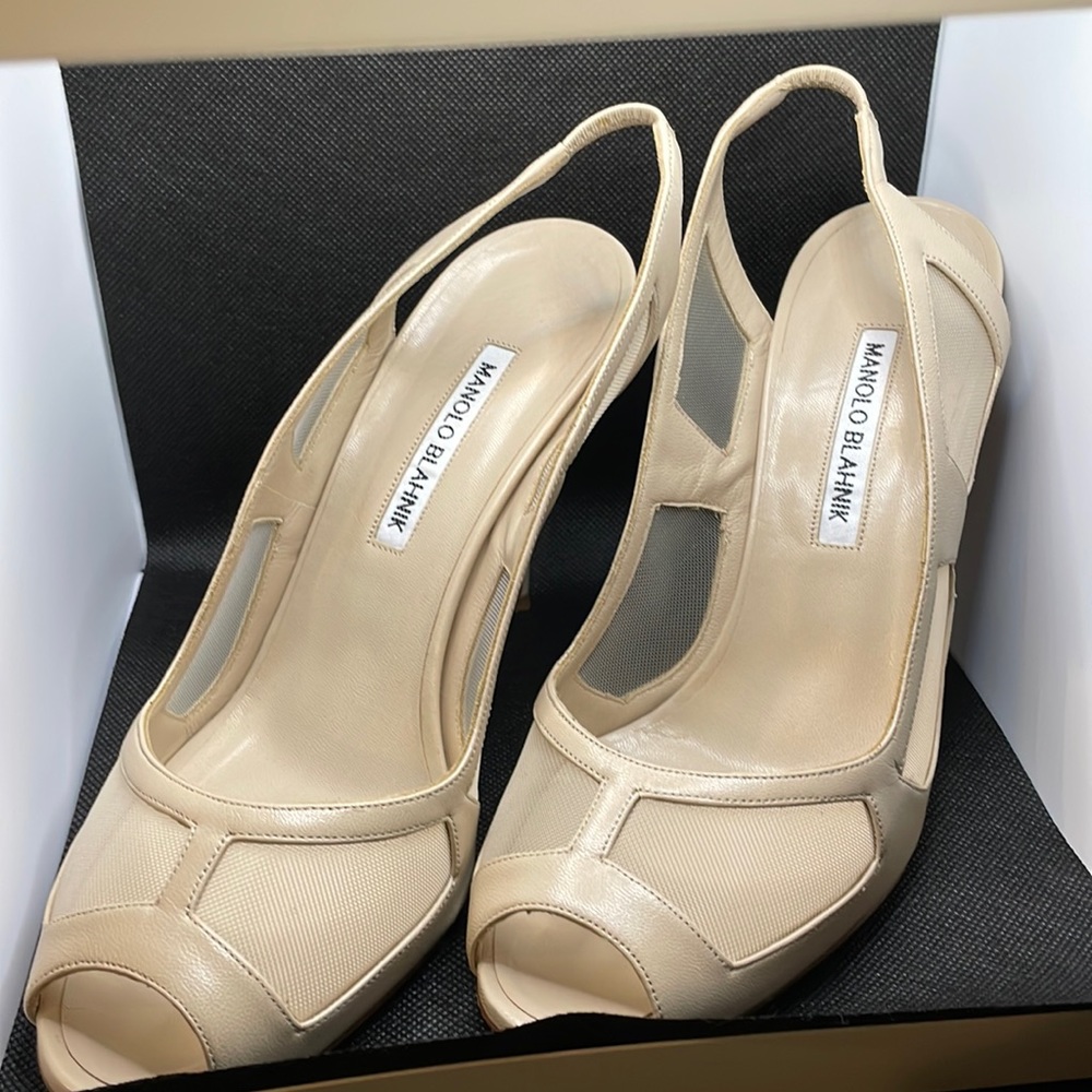 Manolo Blahnik, 3 inch heal, open toe sling backs.